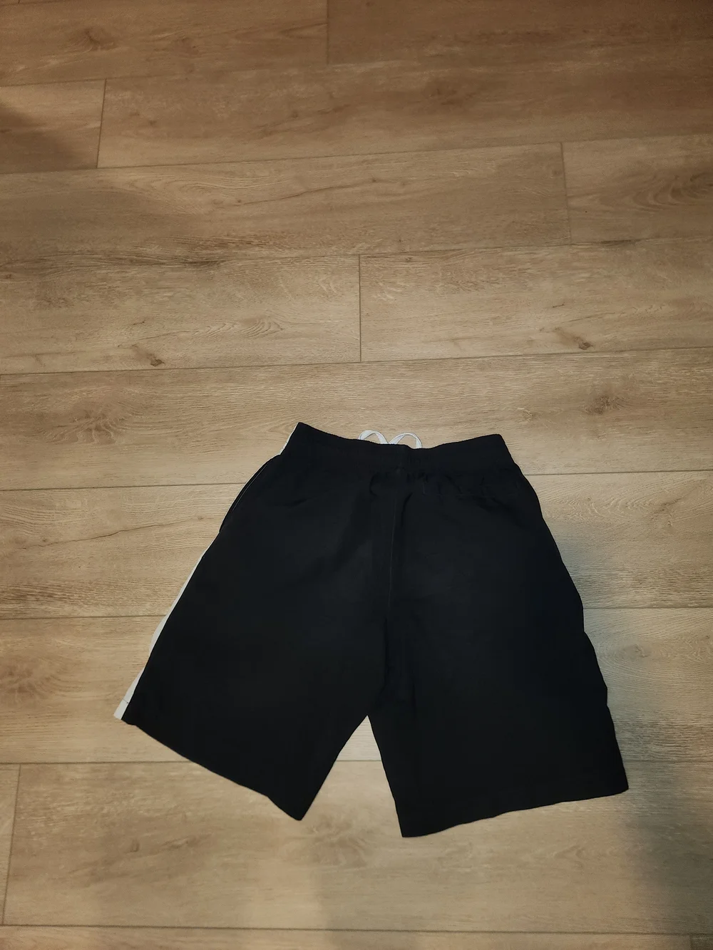 Nike Men's Black Shorts with White Side Stripe